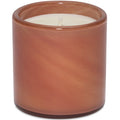 Brown candle in a wooden holder on a white background