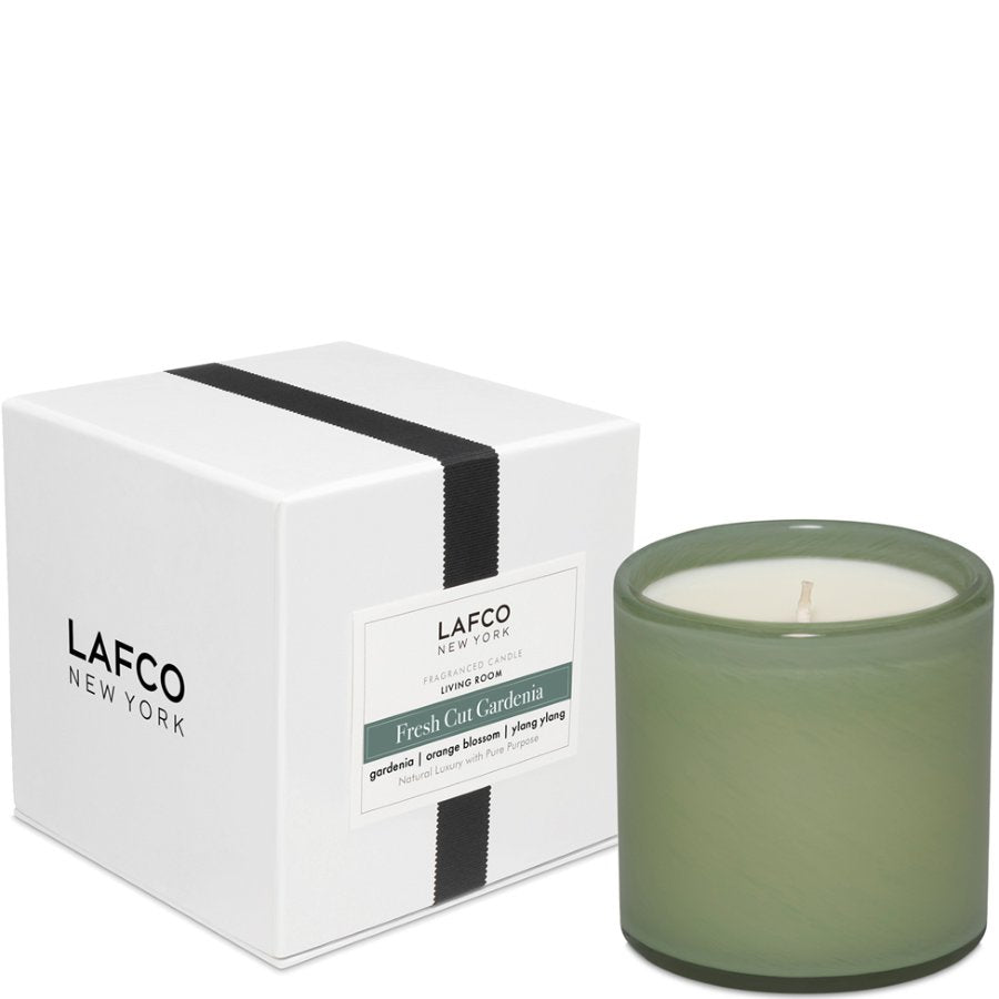 Green candle in a box with 'LAFCO New York' branding on a white background