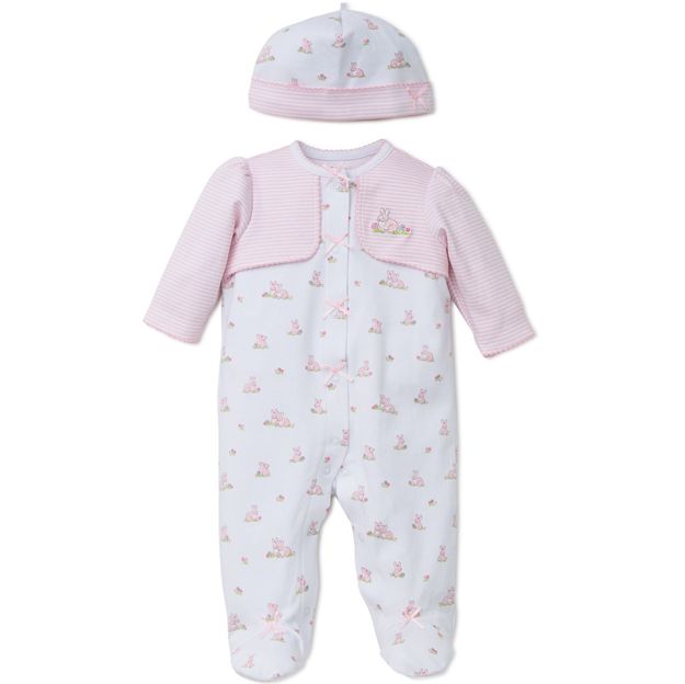 Baby outfit with pink jacket, white onesie with boat pattern, and matching hat on a white background