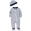 Baby outfit with striped onesie, hat, and shoes on a white background