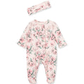Floral baby onesie with matching headband on a white background