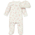 Baby onesie with floral pattern and matching hat on a white background