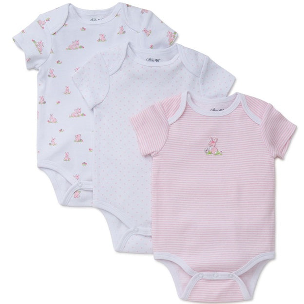 Three baby bodysuits with different patterns on a white background