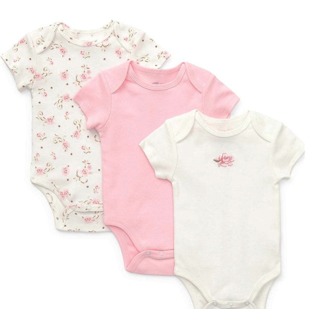 Three baby bodysuits with different patterns on a white background