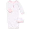 Pink baby gown with matching hat on a white background