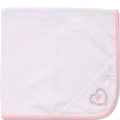 White towel with pink border and embroidered design on a white background