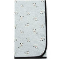 Gray blanket with black border and dalmatian dog pattern on a white background
