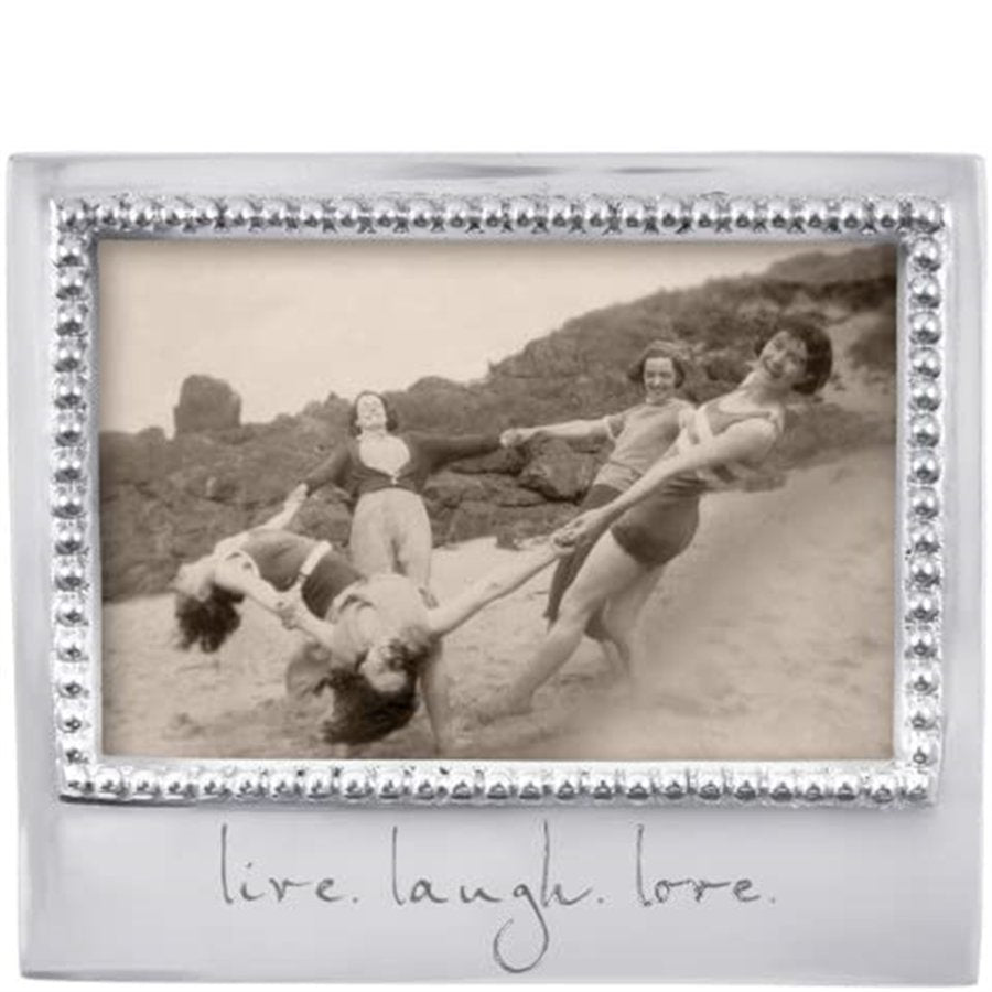 Decorative photo frame with a vintage-style beach scene and 'live. laugh. love.' text.
