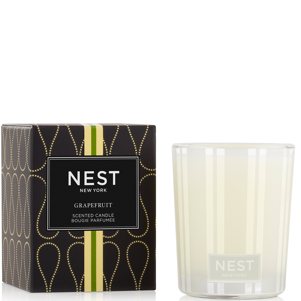 NEST New York grapefruit scented candle with packaging on a white background