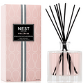 NEST New York wellness reed diffuser with packaging on a white background