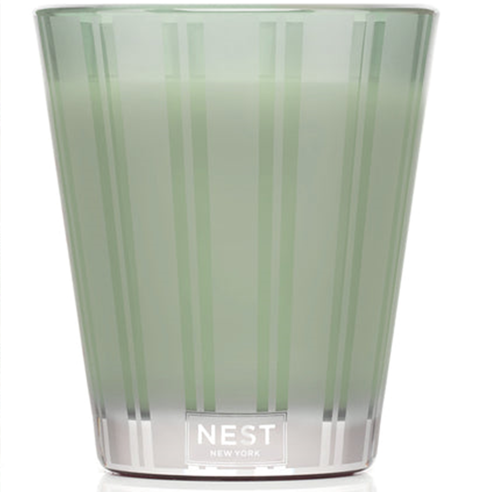 Green striped glass with 'NEST New York' logo on a white background