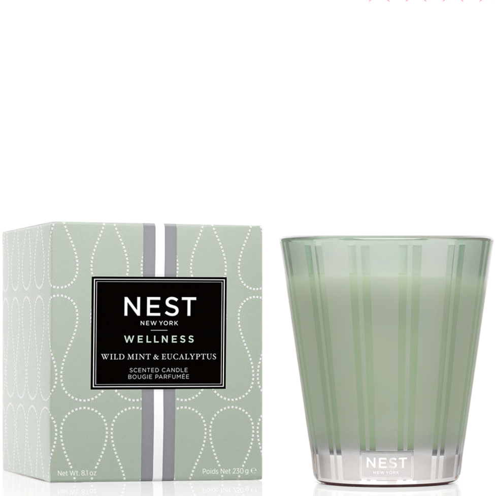 NEST New York wellness candle and packaging on a white background