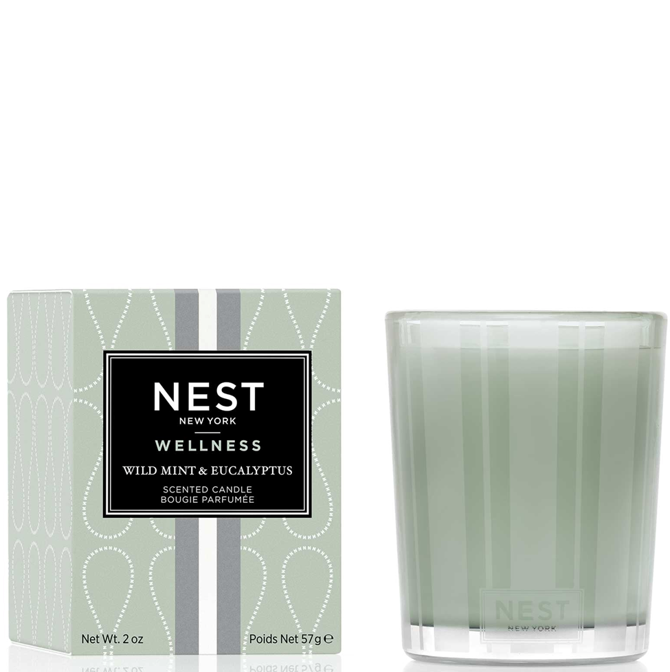 NEST New York wellness candle and packaging on a white background
