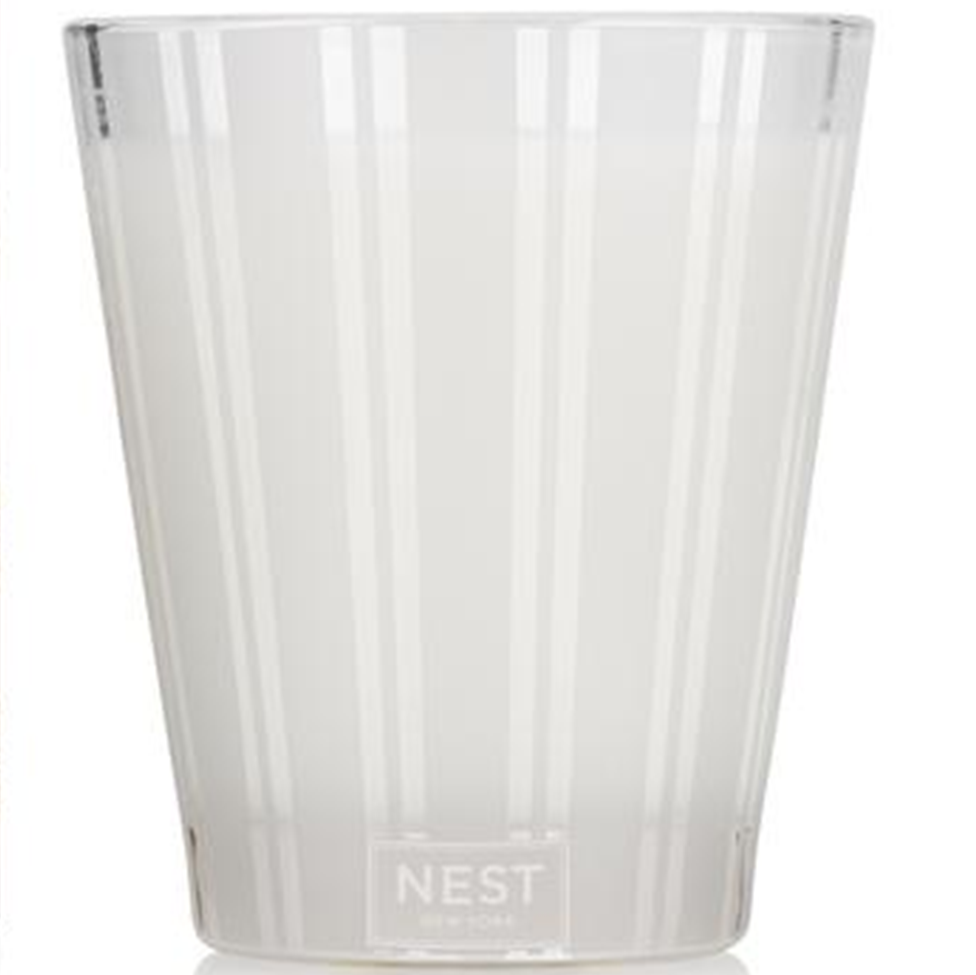 Clear plastic cup with 'NEST' branding on a white background