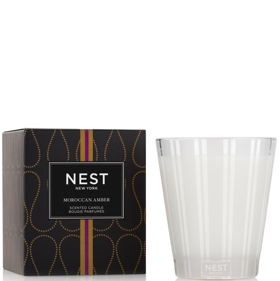 NEST New York Moroccan Amber scented candle with packaging on a white background
