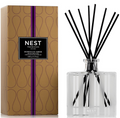 NEST Fragrances diffuser with packaging on a white background