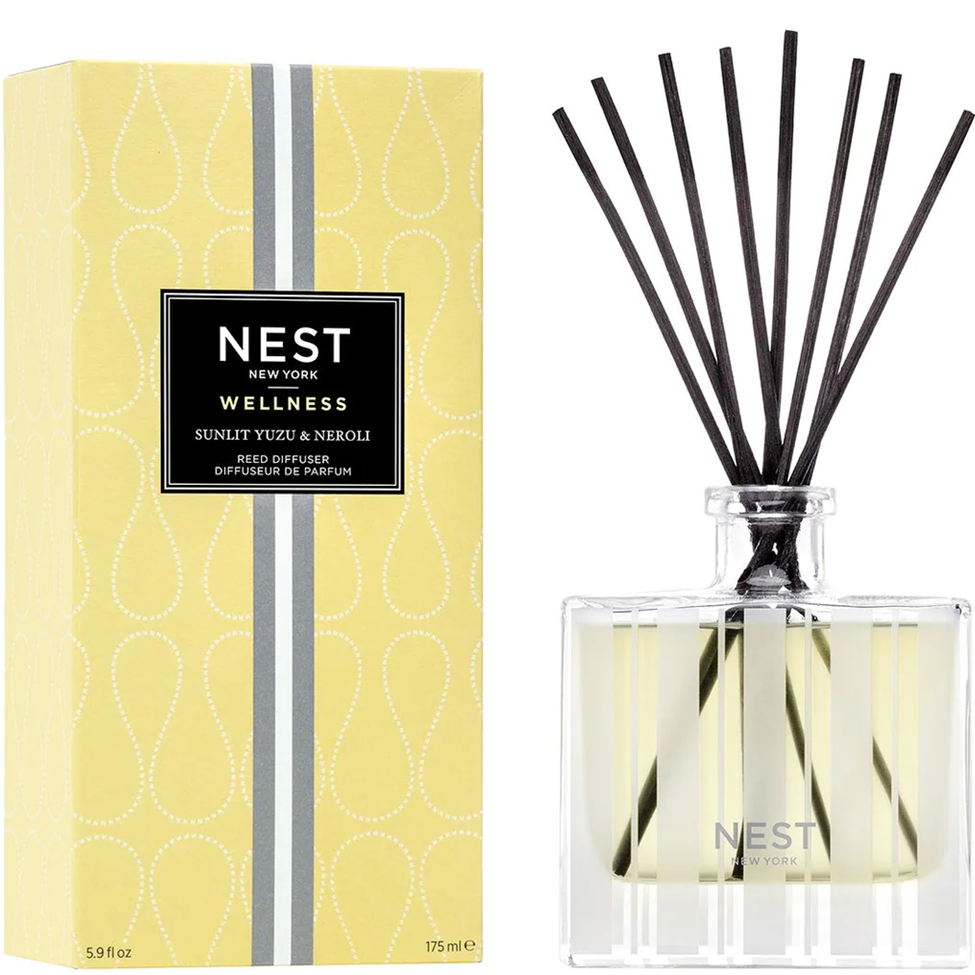NEST New York wellness diffuser with packaging on a white background