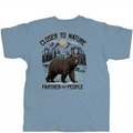 Light blue t-shirt with bear graphic and text on a white background