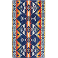 Colorful patterned rug with geometric design on a white background
