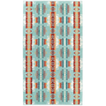 Patterned rug with geometric design on a light blue background
