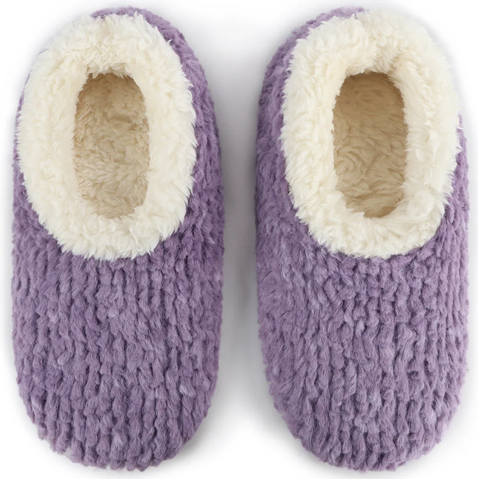 Pair of purple slippers with white lining on a white background