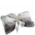 Gray fluffy blanket with a white ribbon and branding on a white background