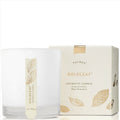 Thymes Goldleaf candle with packaging on a white background