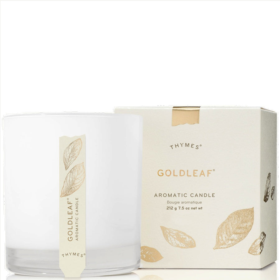Thymes Goldleaf candle with packaging on a white background