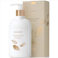 Thymes Goldleaf perfumed body crème bottle and packaging on a white background