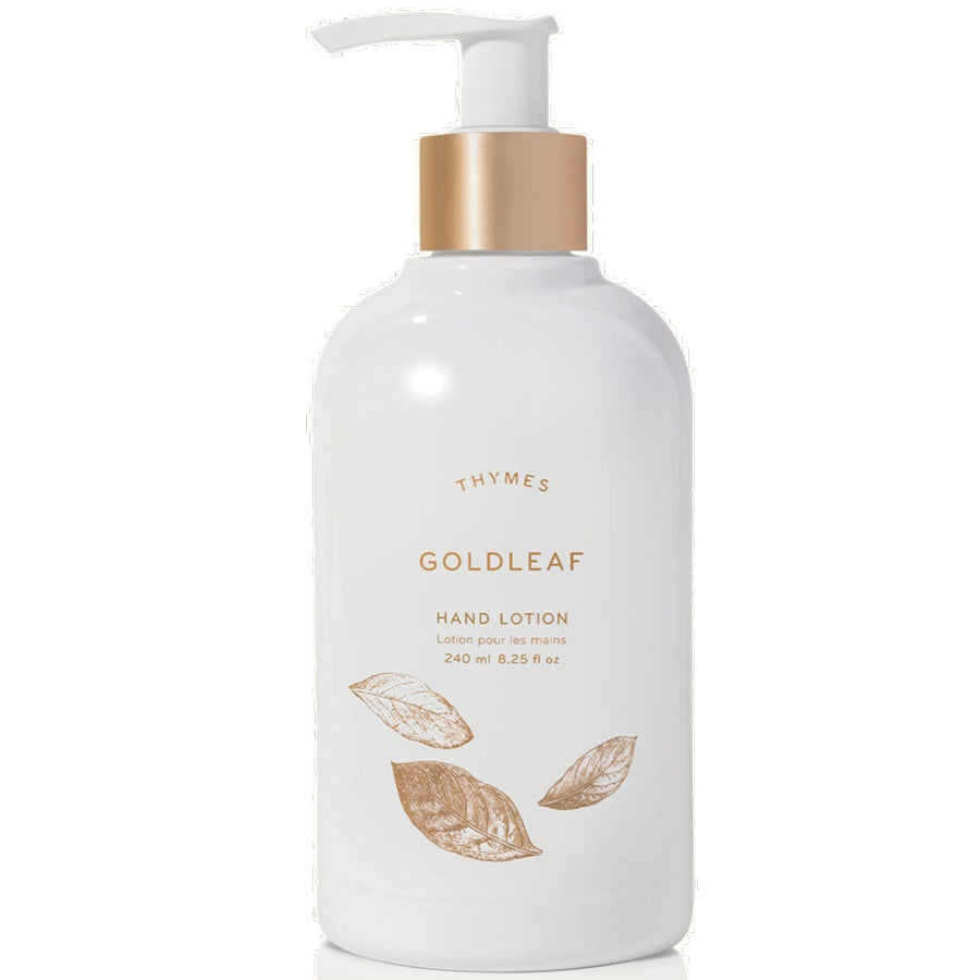 White hand lotion bottle with gold pump and 'Thymes Goldleaf' text on a white background