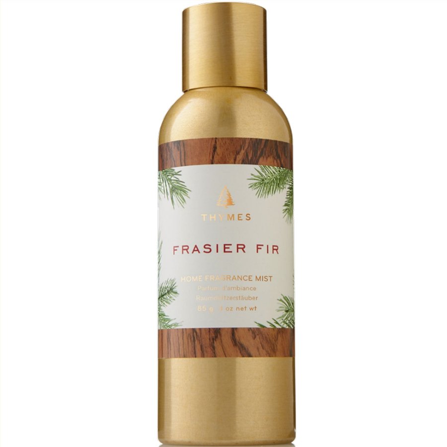 Thymes Frasier Fir fragrance mist bottle with gold cap and wooden accents on a white background
