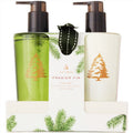 Thymes Frasier Fir soap set with green and white bottles on a white background