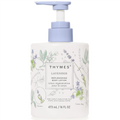 Thymes lavender replenishing body lotion with a pump on a white background