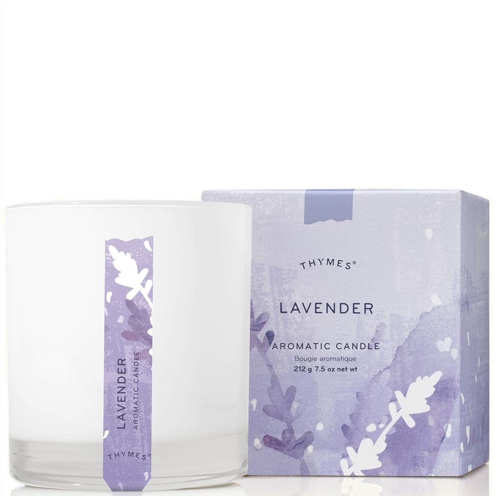 Thymes lavender candle with packaging on a white background