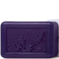 Purple rectangular soap with leaf design on a white background