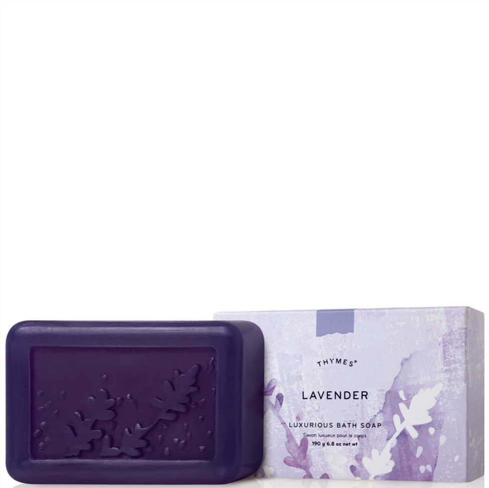 Purple lavender soap bar with packaging on a white background