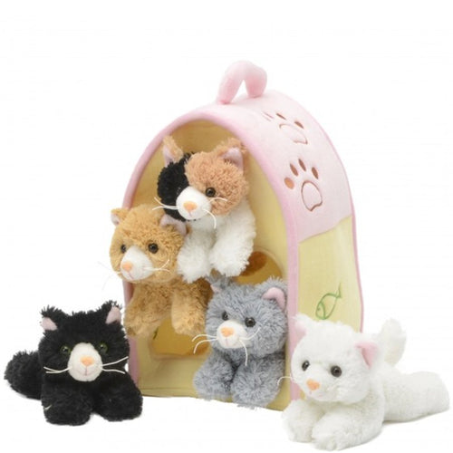 Set of plush cat toys with a pink carrier on a white background