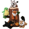 Set of plush forest animals including a raccoon, frog, fox, and chipmunk on a tree stump.