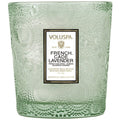 Green embossed candle with Voluspa label on a white background