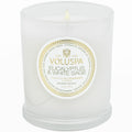 Voluspa candle with eucalyptus and white sage scent on a white background