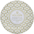Voluspa candle packaging with gold geometric pattern on a white background