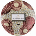 Decorative pomander with floral patterns and Voluspa branding on a white background