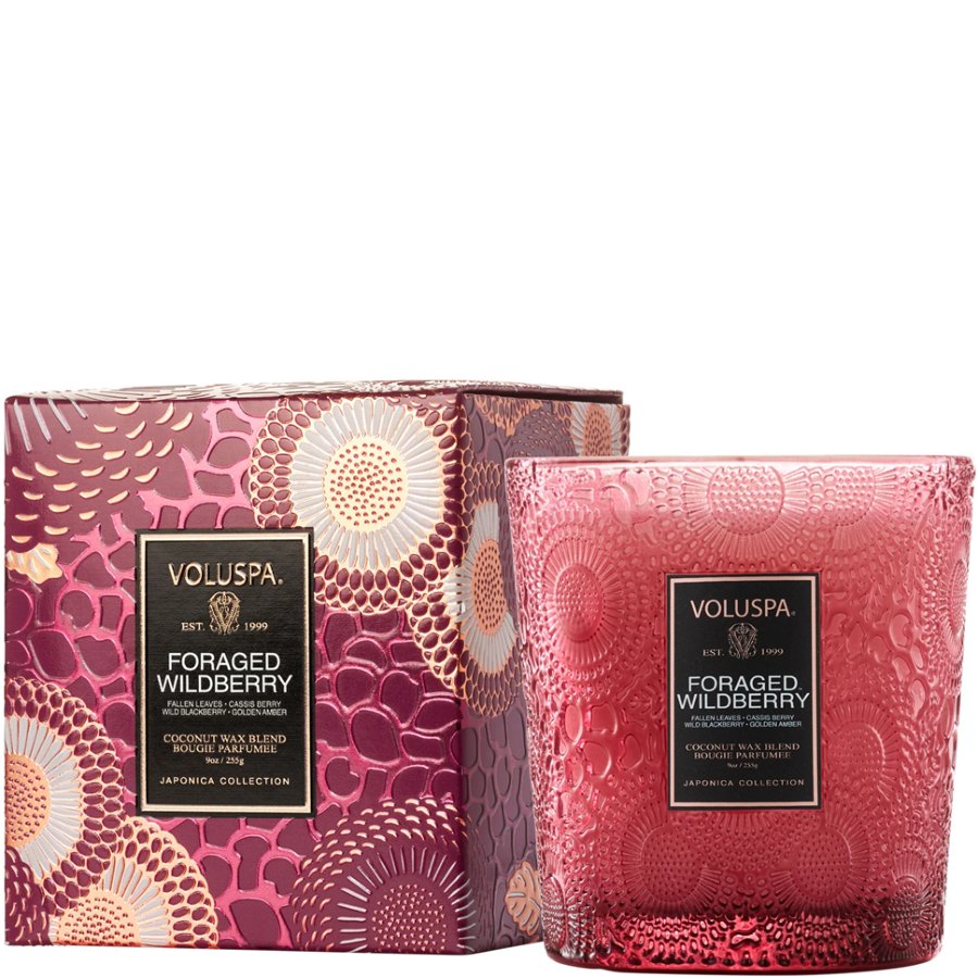 Voluspa Foraged Wildberry candle with decorative packaging on a white background