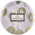 Round Voluspa Panjore Lychee scented candle packaging with floral design