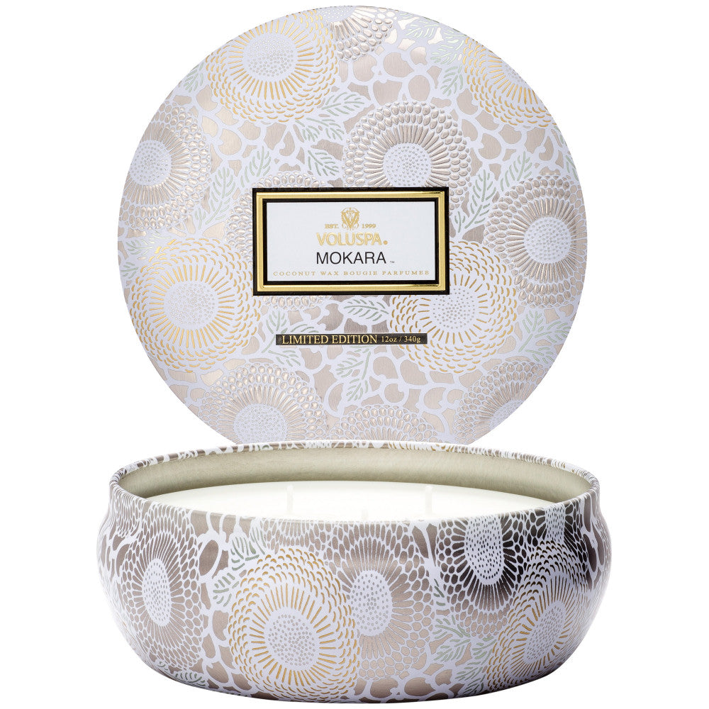 Round decorative box with floral patterns and 'Mokara' branding on a white background