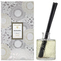 Voluspa Mokara diffuser with packaging featuring floral patterns
