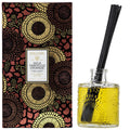 Voluspa diffuser set with decorative box and glass bottle on a white background