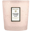 Pink textured candle with Voluspa Panjore Lychee label on a white background