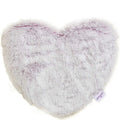 Heart-shaped fluffy pillow with a tag on a white background