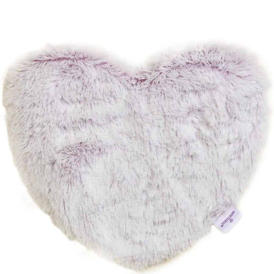 Heart-shaped fluffy pillow with a tag on a white background
